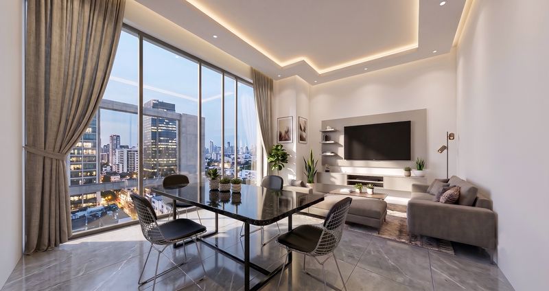 Living room of a one bedroom residence with skyline views