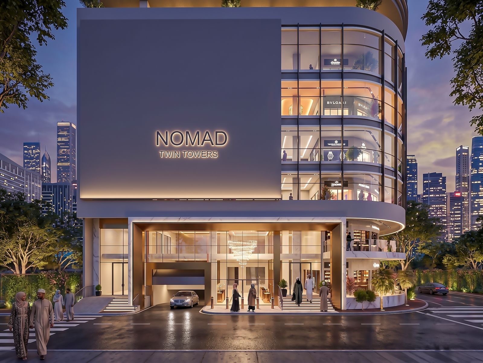 Illuminated arrival lobby and porte-cochère at Nomad Twin Towers by night