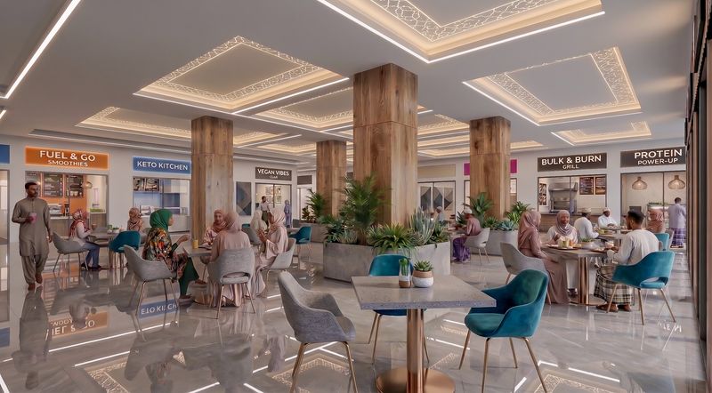 Diners at open seating in the food court, beneath a lit fretwork ceiling